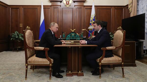 Президент РФ Владимир Путин и министр экономического развития РФ Максим Орешкин во время встречи. 3 июня 2019