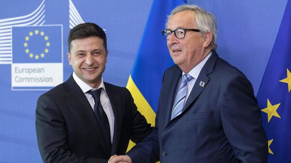 Президент Украины Владимир Зеленский и председатель Европейской комиссии Жан-Клод Юнкер во время встречи в Брюсселе. 4 июня 2019