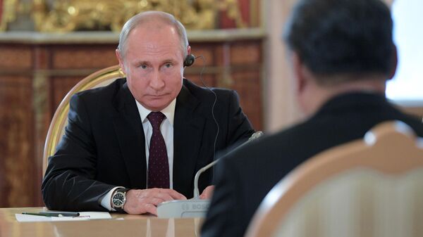 Президент РФ Владимир Путин во время переговоров с председателем КНР Си Цзиньпинем в Кремле