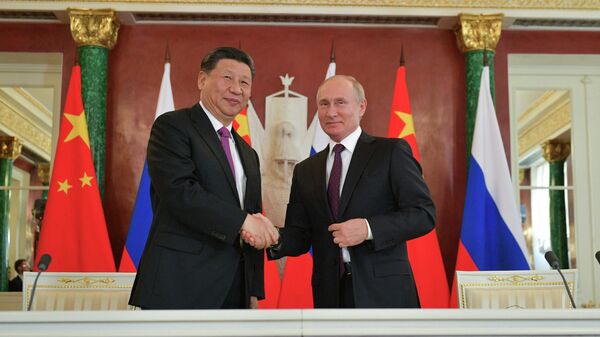 Президент РФ Владимир Путин и председатель КНР Си Цзиньпин на пресс-конференции по итогам российско-китайских переговоров в Кремле. 5 июня 2019