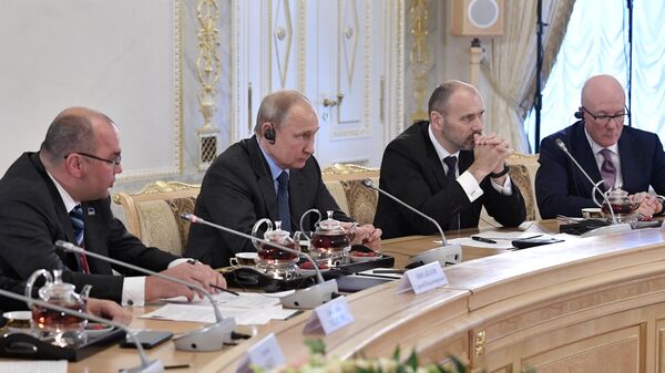 Президент РФ Владимир Путин во время встречи с руководителями и главными редакторами ведущих мировых информационных агентств в рамках Петербургского международного экономического форума 2019