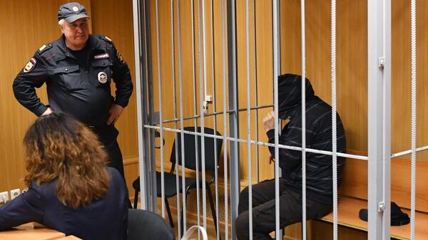 Подозреваемый в убийстве бизнесмена Шабтая фон Калмановича во время избрания меры пресечения в Пресненском суде Москвы. 6 июня 2019