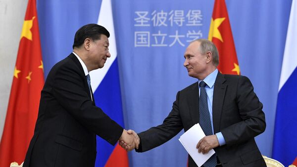 Президент РФ Владимир Путин и председатель КНР Си Цзиньпинь