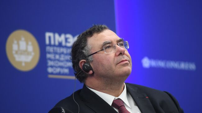 Президент, председатель совета директоров Total Патрик Пуянне