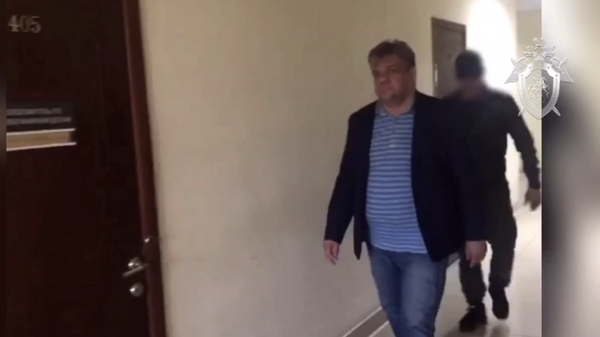  Начальника тыла МВД по Амурской области Михаил Робканов задержанный в связи с подозрением в злоупотреблении должностными полномочиями. 7 июня 2019