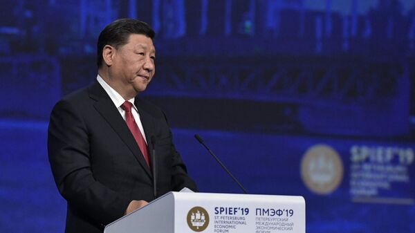 Председатель Китайской Народной Республики Си Цзиньпин выступает на пленарном заседании Петербургского международного экономического форума 2019 