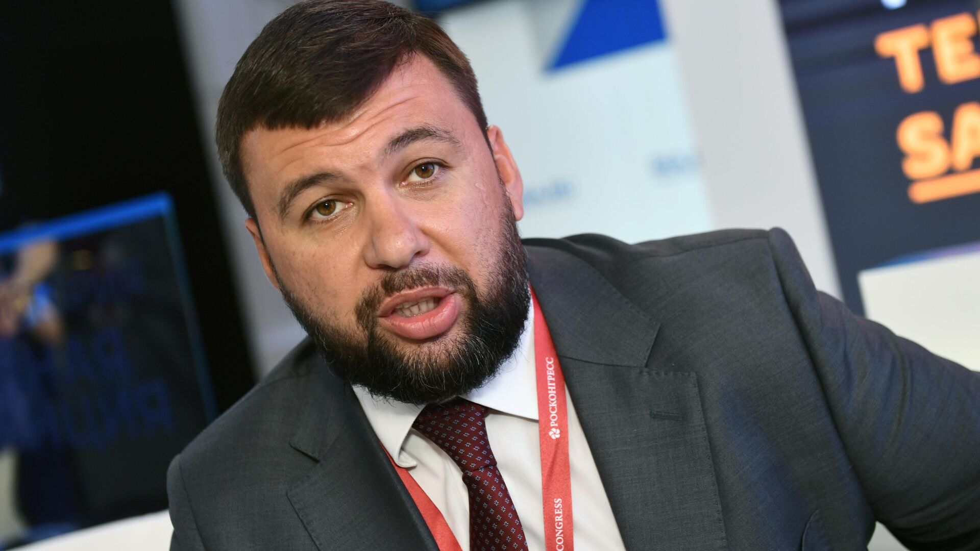 The head of the DPR Denis Pushilin during an interview at the stand of MIA Russia today on the second day of SPIEF - 1920, 12/04/2021