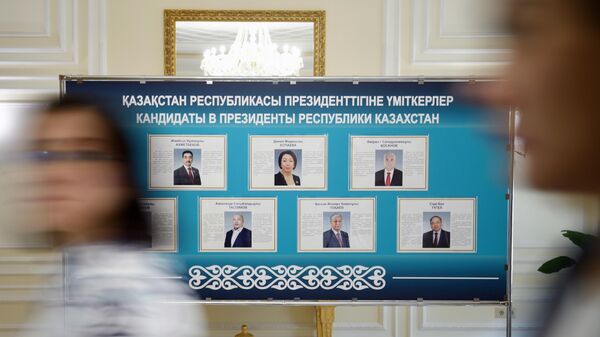 Портреты кандидатов в президенты Казахстана на избирательном участке № 265 в посольстве Казахстана в Москве. 9 июня 2019