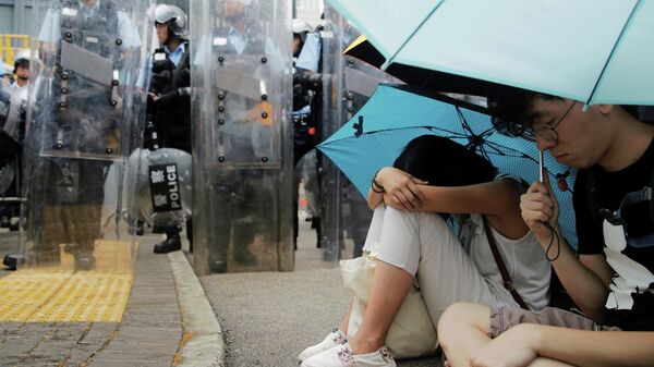 Демонстранты во время акции протеста в Гонконге