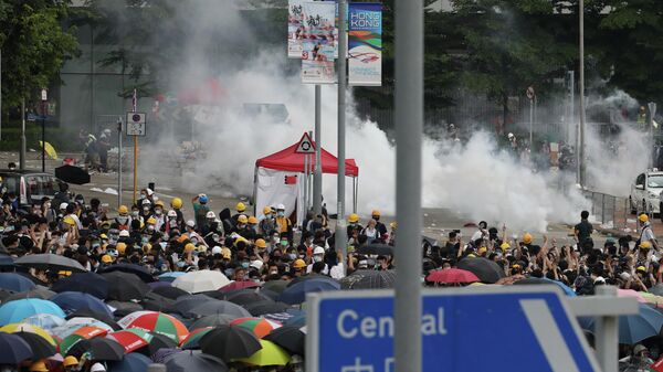 Акция протеста жителей Гонконга против поправок к закону об экстрадиции