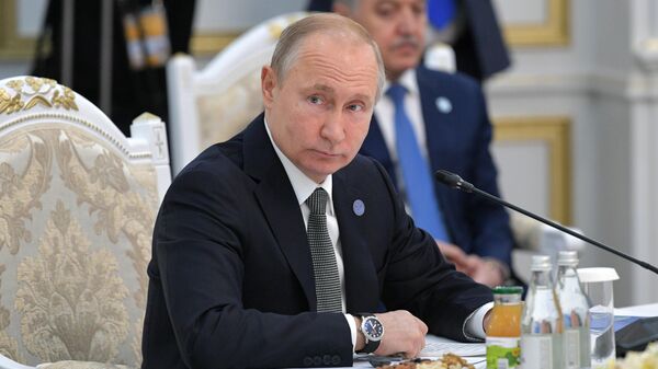 Президент РФ Владимир Путин во время заседания Совета глав государств - членов ШОС в Бишкеке. 14 июня 2019