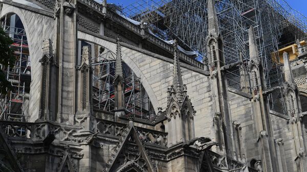 Восстановительные работы после пожара в Соборе Парижской Богоматери в Париже. Архивное фото