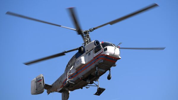 Вертолет Ка-32А Московского авиационного центра во время учений