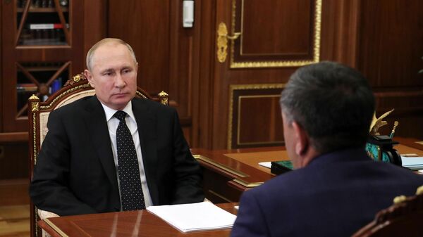 Президент РФ Владимир Путин и Юнус-Бек Евкуров во время встречи. 26 июня 2019