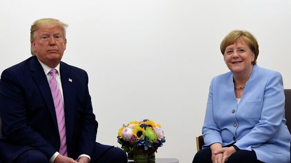 Канцлер Германии Ангела Меркель с президентом США Дональдом Трампом на саммите G20. 28.06.2019