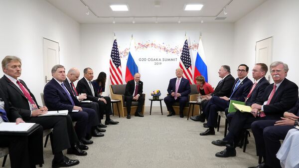 Президент РФ Владимир Путин и президент США Дональд Трамп на полях саммита Группы двадцати в Осаке. 28 июня 2019