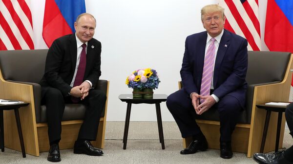 Президент РФ Владимир Путин и президент США Дональд Трамп на полях саммита Группы двадцати в Осаке. 28 июня 2019