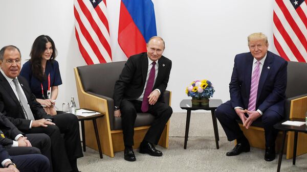 Президент РФ Владимир Путин и президент США Дональд Трамп на полях саммита Группы двадцати в Осаке