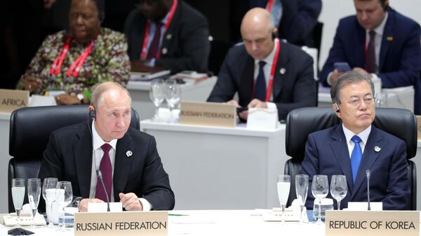 Президент РФ Владимир Путин на заседании глав делегаций государств – участников Группы двадцати. 28 июня 2019