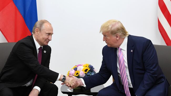 Президент России Владимир Путин и президент США Дональд Трамп