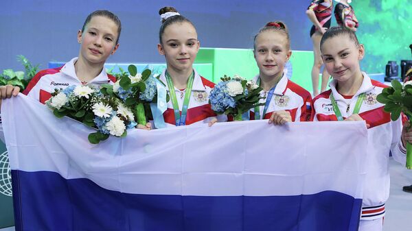 Российские гимнастки после победы на юниорском чемпионате мира