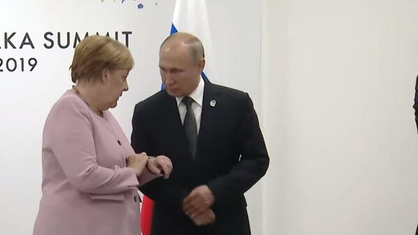 Путин подсказал потерявшейся Меркель