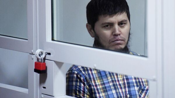 Хазратхон Додохонов во время оглашения приговора участнику банды GTA в Московском областном суде. 2 июля 2019