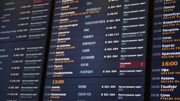 Электронное табло с информацией о рейсах в аэропорту Шереметьево