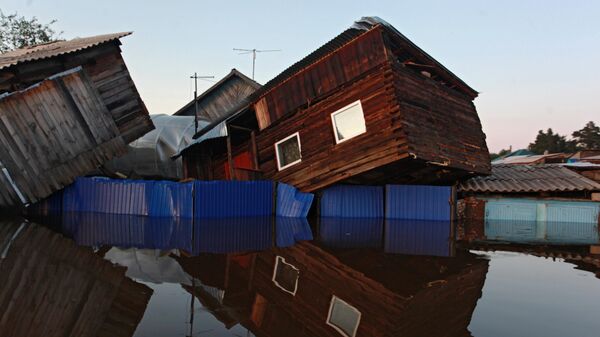 Унесенный паводком дом в городе Тулун в Иркутской области