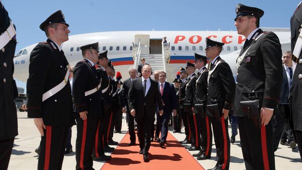  Президент РФ Владимир Путин во время встречи в аэропорту Фьюмичино города Рима. 4 июля 2019