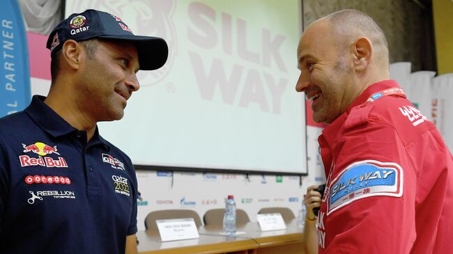 Нассер Аль-Аттия (слева)