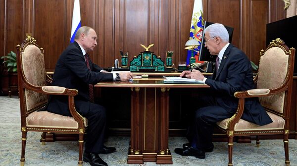 Президент РФ Владимир Путин и глава Дагестана Владимир Васильев во время встречи. 8 июля 2019