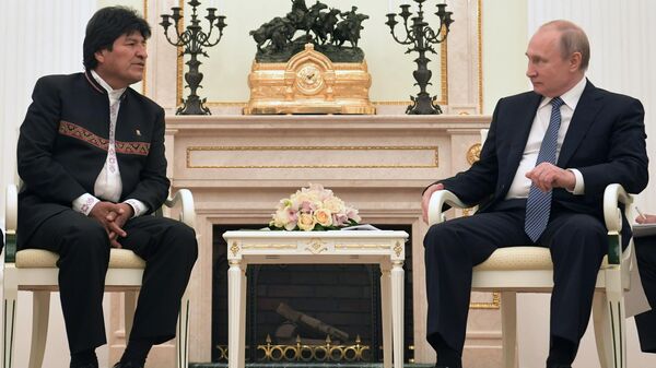 Президент РФ Владимир Путин и президент Боливии Эво Моралес во время встречи. 11 июля 2019