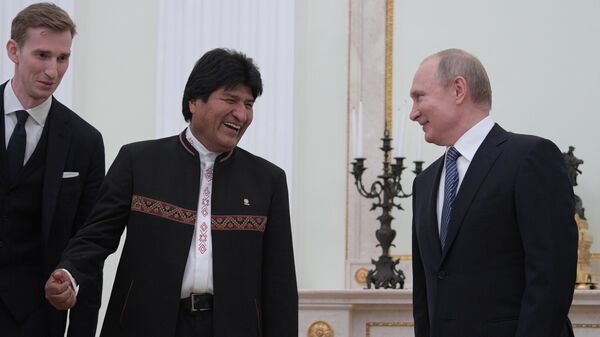 Президент РФ Владимир Путин и президент Боливии Эво Моралес во время встречи. 11 июля 2019