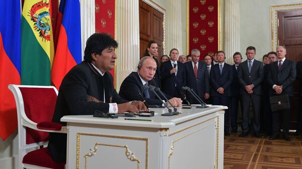 Президент РФ Владимир Путин и президент Боливии Эво Моралес на совместной пресс-конференции. 11 июля 2019