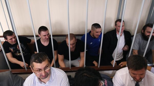 Задержанные украинские моряки на заседании Лефортовского суда города Москвы, где рассматривается ходатайство следствия о продлении им ареста. 17 июля 2019