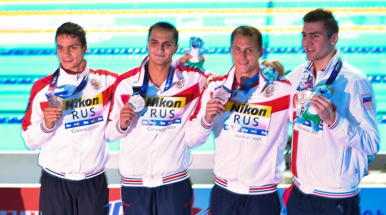 Пловцы сборной России Евгений Рылов, Владислав Гринев, Владимир Морозов, и Климент Колесников Пловцы сборной России Евгений Рылов, Владислав Гринев, Владимир Морозов, и Климент Колесников