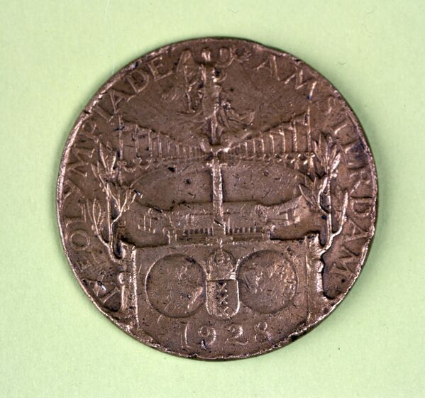 Медаль IX летних Олимпийских игр в Амстердаме в 1928 году.