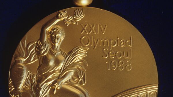 Золотая медаль XXIV Летних Олимпийских игр в Сеуле.