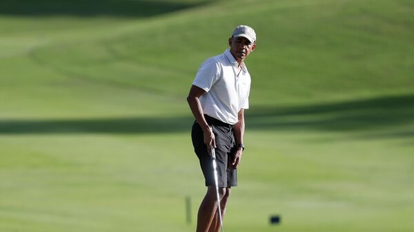 Президент США Барак Обама во время игры в гольф. 21 декабря 2016 года