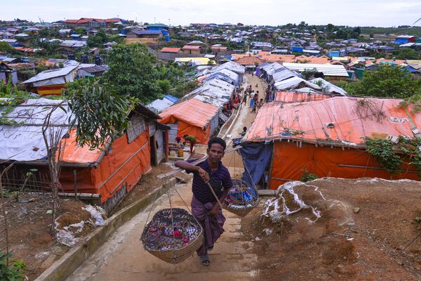 Торговец рохинджа в лагере беженцев Кутупалонг