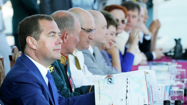Председатель правительства РФ Дмитрий Медведев во время парада кораблей в Севастополе в честь Дня Военно-морского флота России