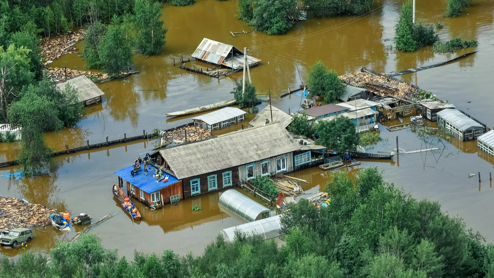 Затопленные дома в селе Норск в Селемджинском районе Амурской области Затопленные дома в селе Норск в Селемджинском районе Амурской области - РИА Новости, 1920, 28.09.2020