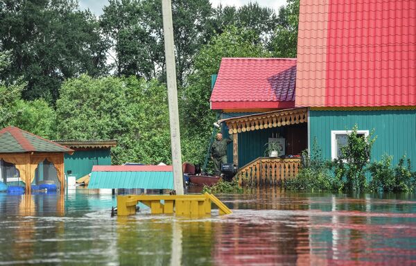 Затопленный дом в селе Норск в Селемджинском районе Амурской области