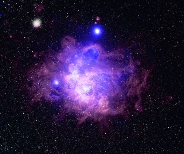 Звездообразование NGC 604 в Галактике Треугольника Звездообразование NGC 604 в Галактике Треугольника