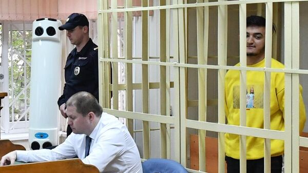 Самариддин Раджабов, обвиняемый по уголовному делу о массовых беспорядках в центре Москвы 27 июля, во время рассмотрения ходатайства следствия об аресте в Пресненском суде Москвы. 2 августа 2019