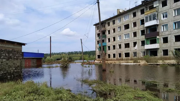 Затопленная улица в городе Тулун в Иркутской области