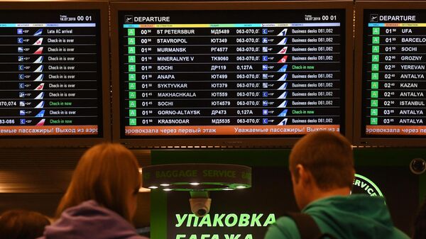 Электронное табло с информацией о рейсах в аэропорту Внуково