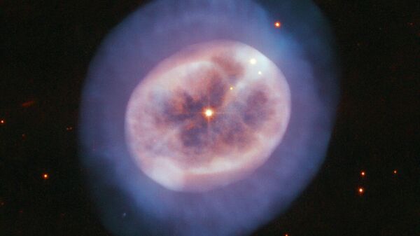 Фотография планетарной туманности NGC 2022 в созвездии Ориона