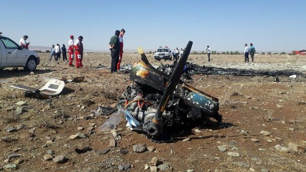 Последствия крушения самолета в провинции Семнан в Иране